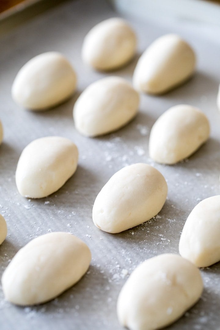Easter egg candy dough, shaped into egg form on pan