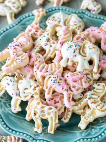 Frosted animal cookies on blue plate