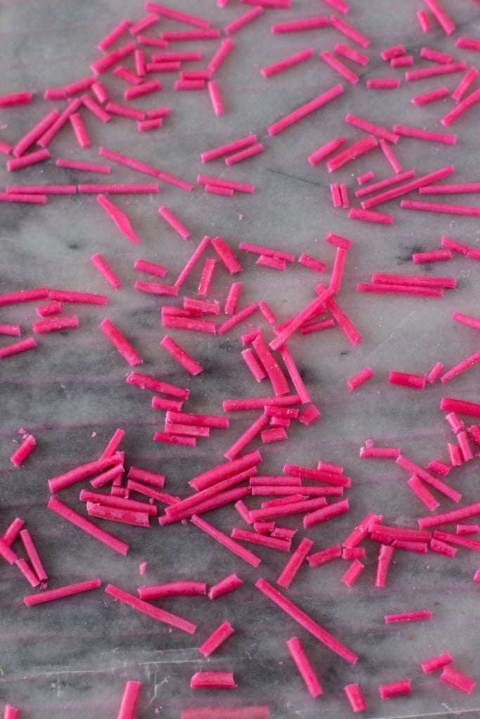 pink homemade sprinkles on marble