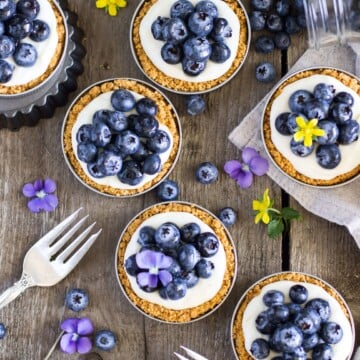 Overhead of blueberry lemon tarts
