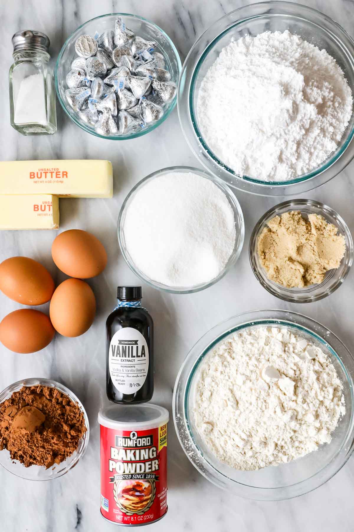 Chocolate blossoms ingredients - overhead on marble