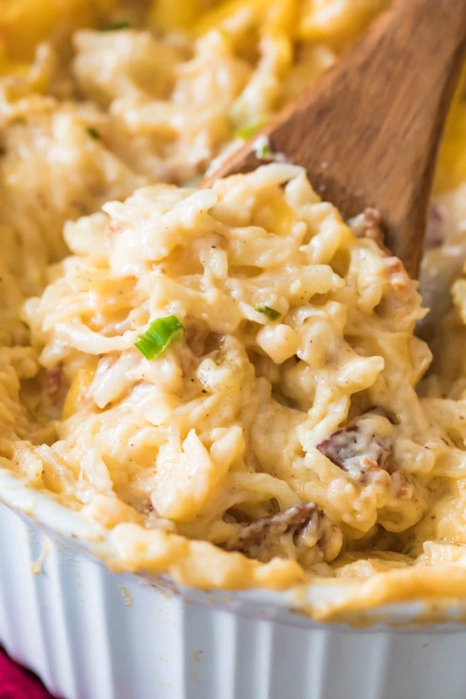 Cheesy hashbrown casserole with bacon and green onions