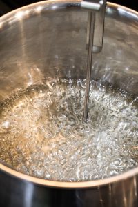 Candy thermometer in peanut brittle mixture