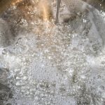 Candy thermometer in honeycomb mixture