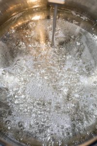Candy thermometer in honeycomb mixture