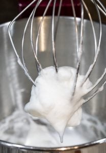 Egg whites forming stiff peaks