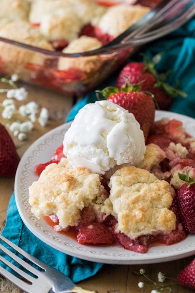 Strawberry cobbler topped with vanilla ice cream
