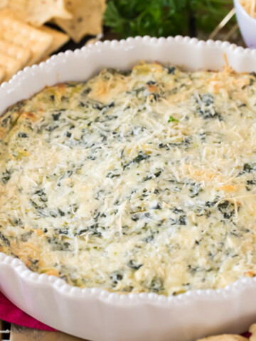 artichoke dip in white pie plate