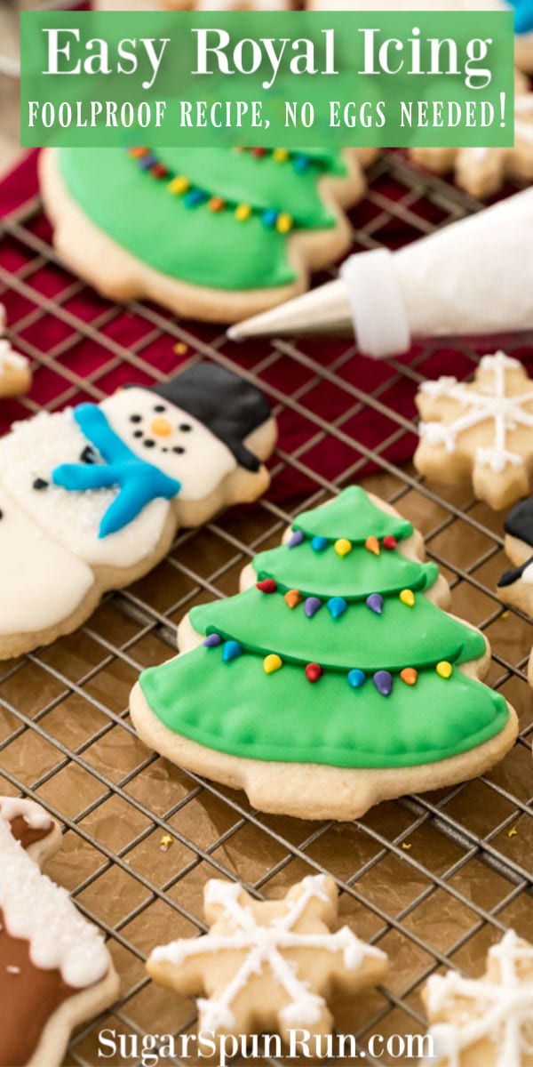 cookies decorated with royal icing on cooling rack