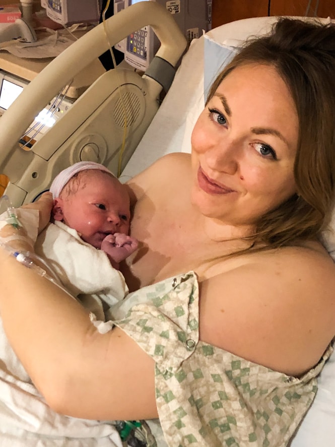 Woman holding newborn