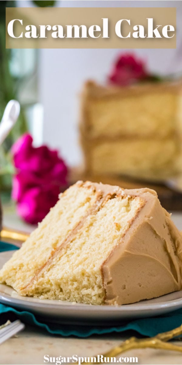 slice of caramel cake on white plate with bite taken out