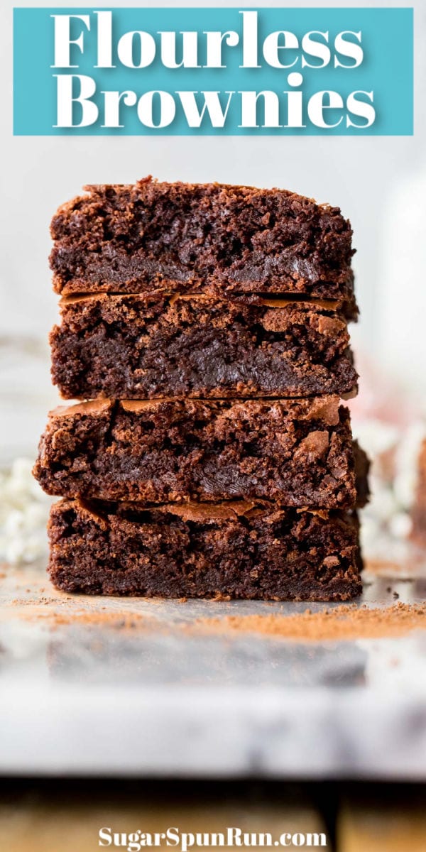 Flourless brownies stacked on marble board
