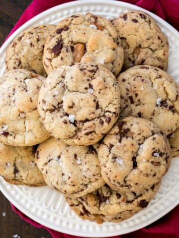 Bacon cookies on white plate, overhead view