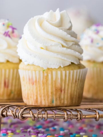 Closeup of cupcake with stabilized whipped cream frosting piped on top
