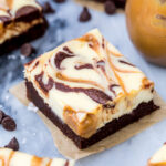Chocolate brownie covered in a cream cheese filling swirled with chocolate and dulce de leche