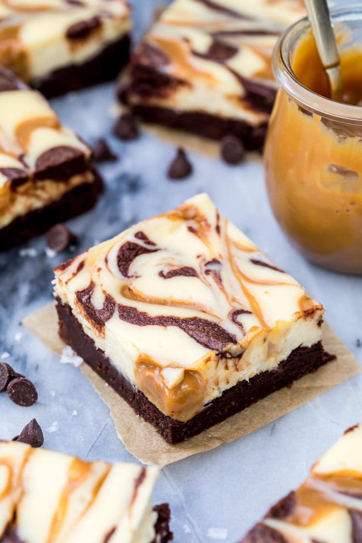 Chocolate brownie covered in a cream cheese filling swirled with chocolate and dulce de leche