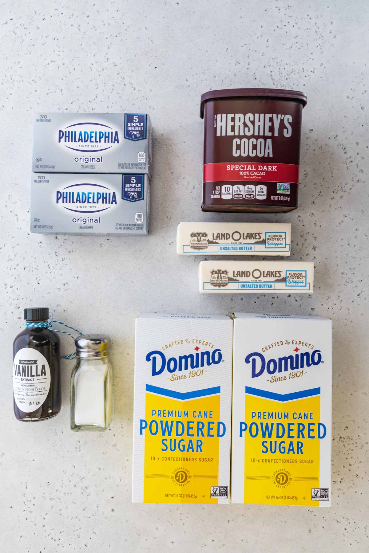top-down view of ingredients for the icing for a cheesecake stuffed cake