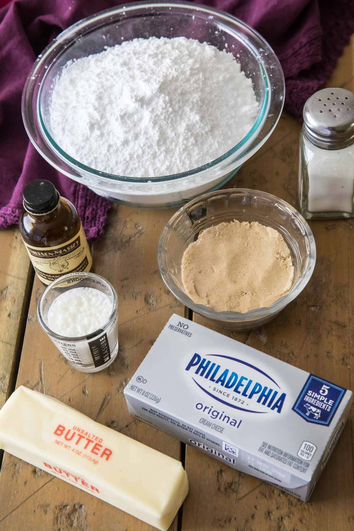 overhead view of ingredients including brown sugar, butter, cream cheese, and more