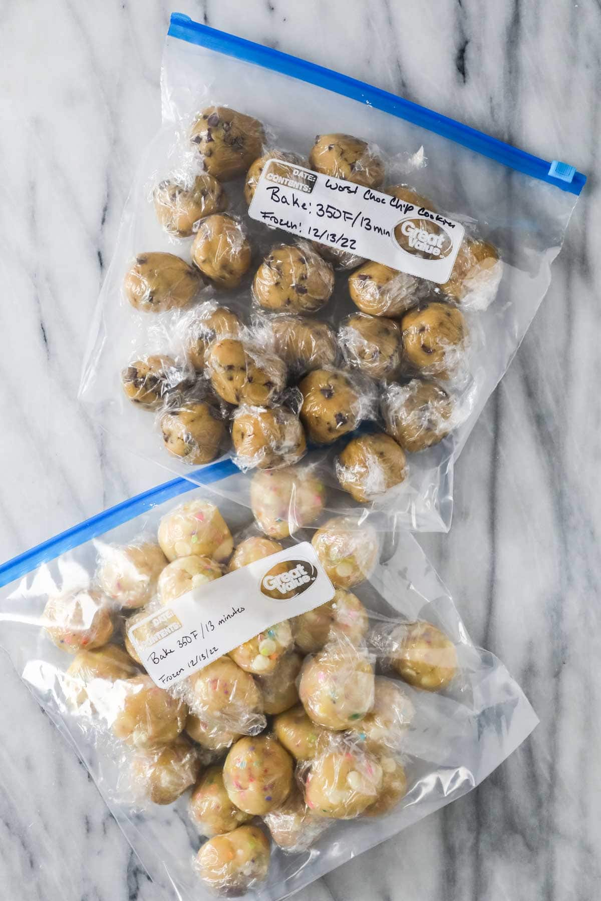 Two ziploc bags of frozen cookie dough balls.