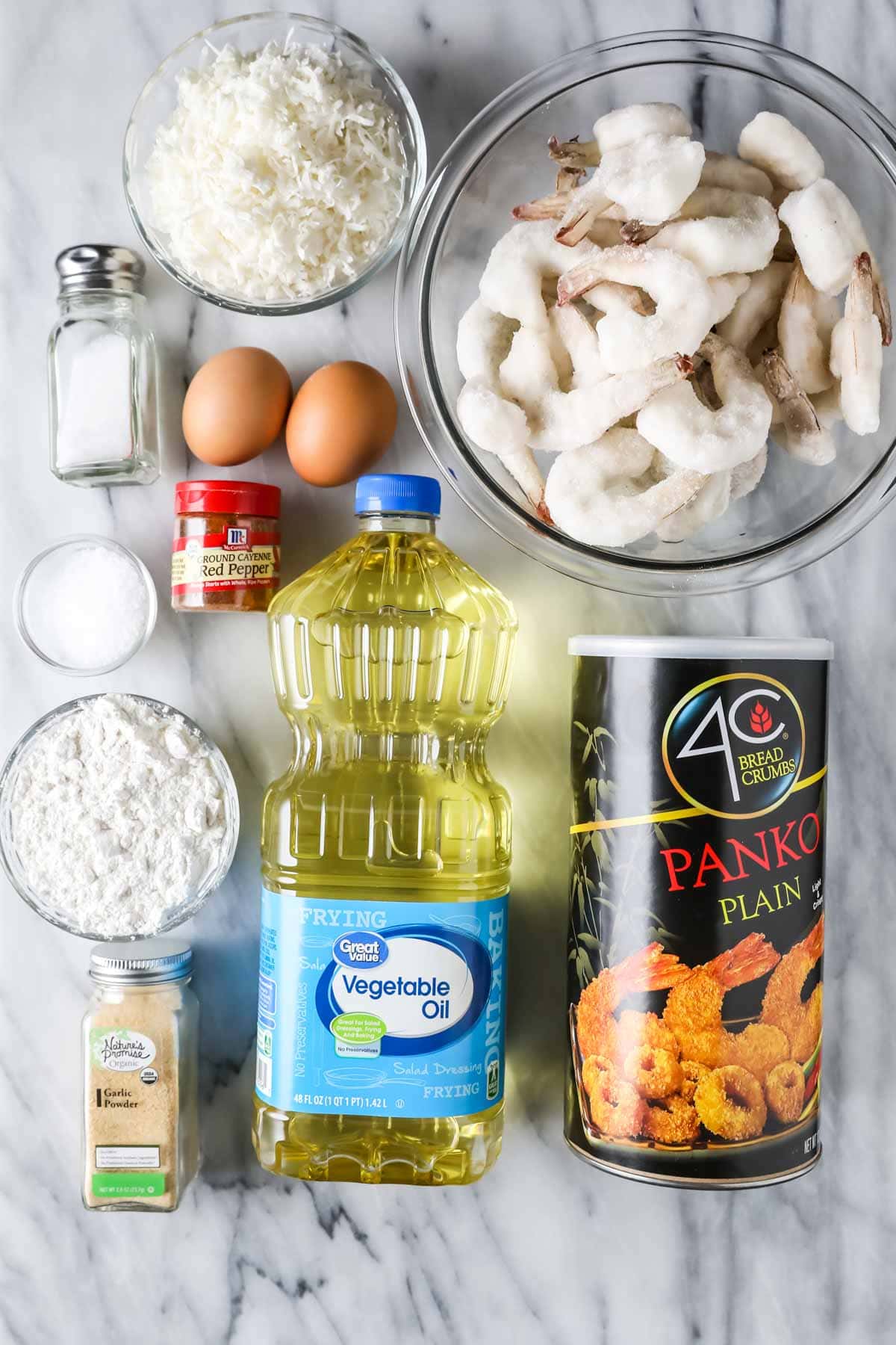 Overhead view of ingredients including shrimp, panko, coconut, and more.