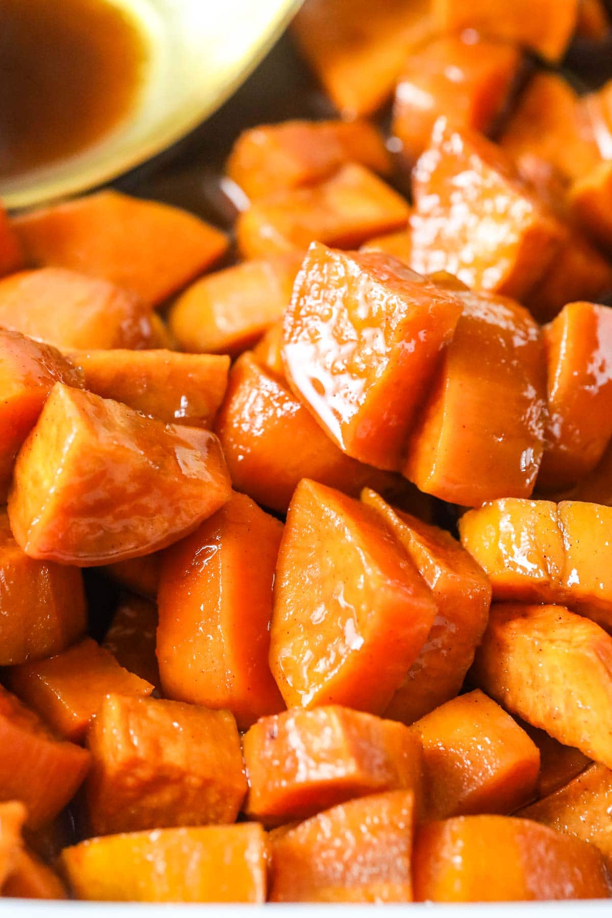Close-up view of candied sweet potatoes.