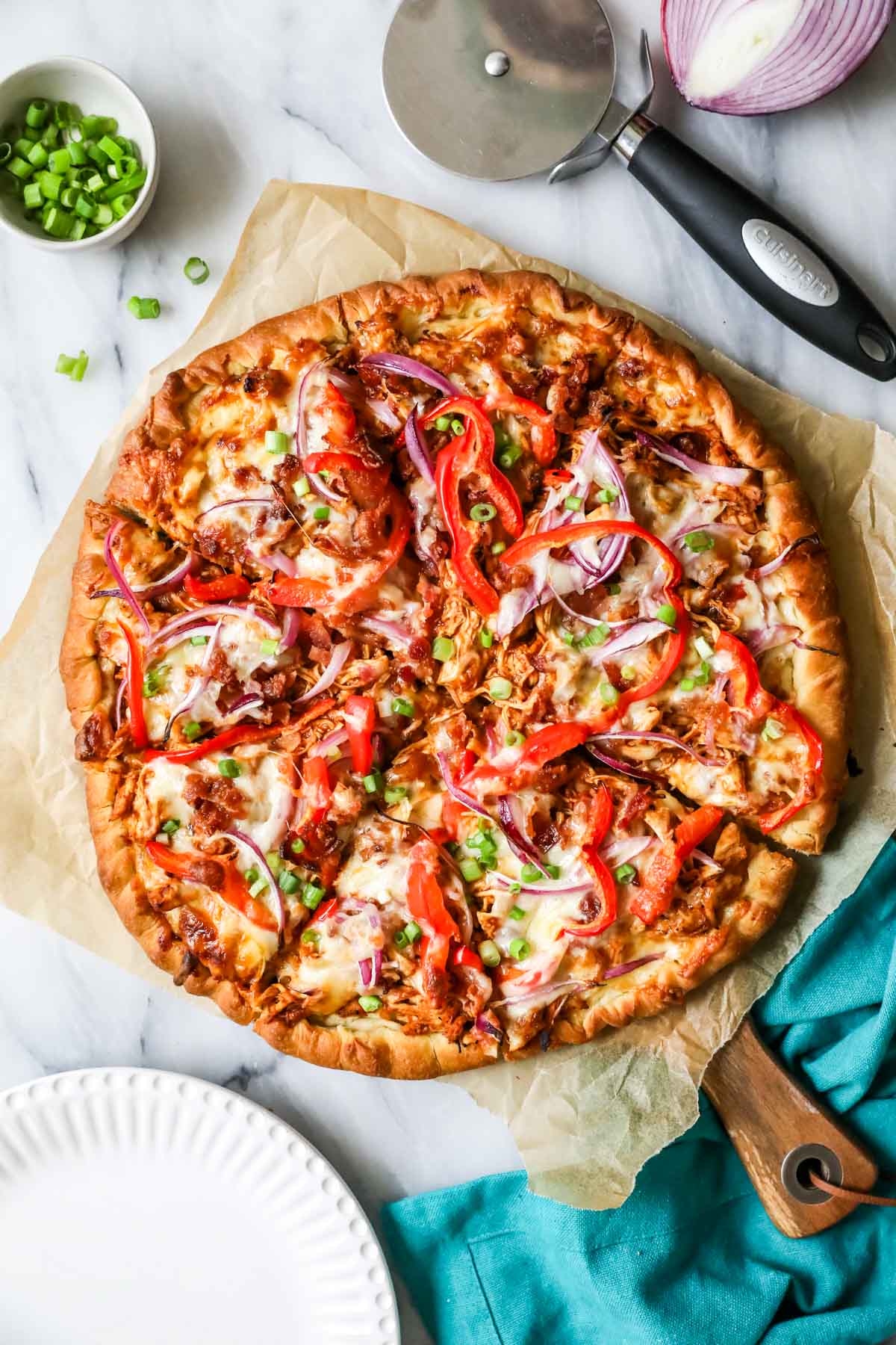 Overhead view of a BBQ chicken pizza after baking.