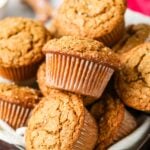 Pile of gingerbread muffins in a bowl.