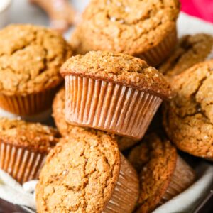 Pile of gingerbread muffins in a bowl.