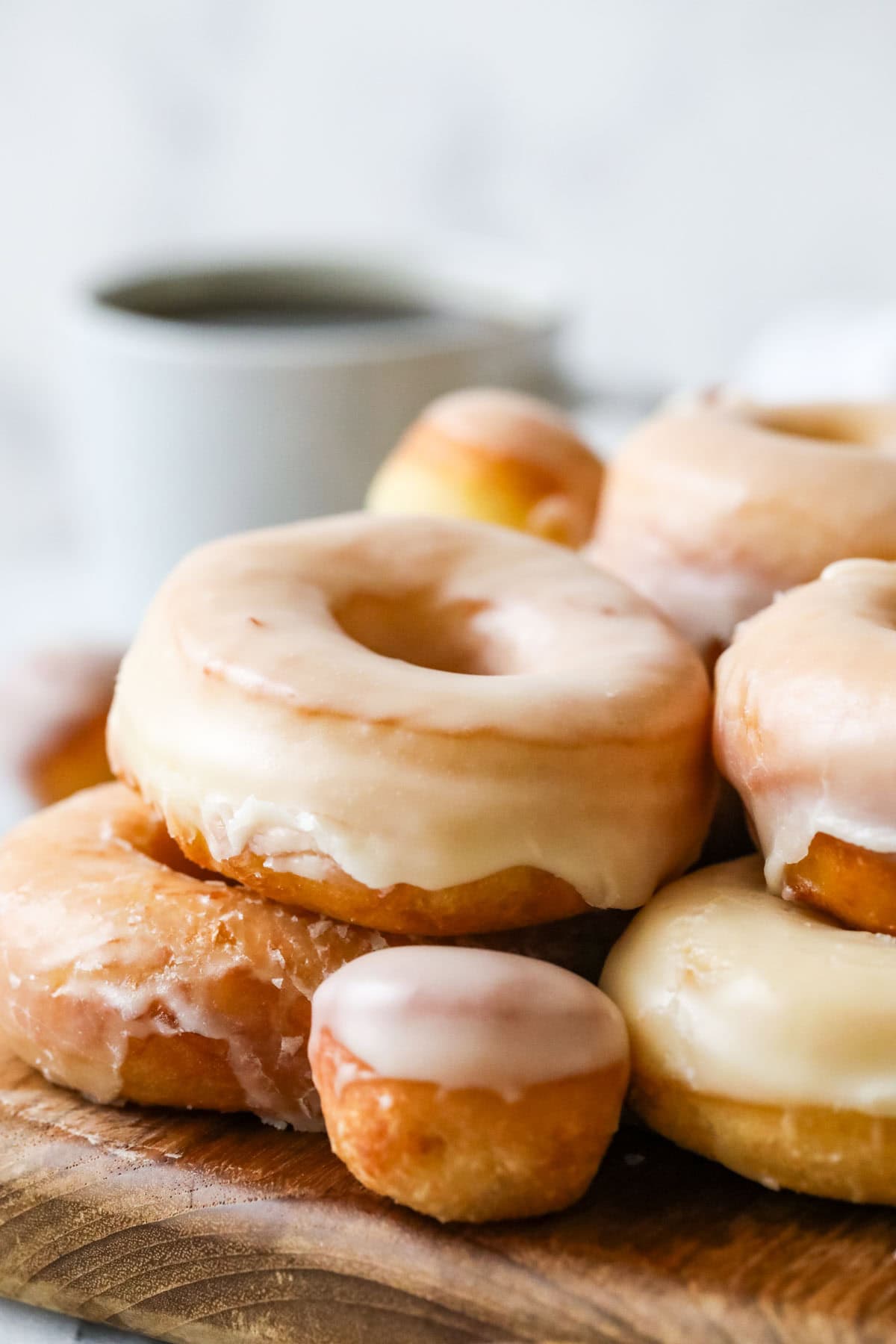 Pile of glazed donuts and donut holes made with sourdough starter instead of yeast.