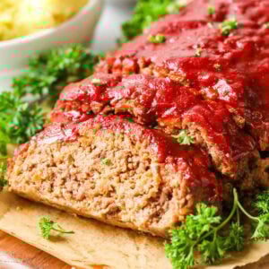 Meatloaf with one slice cut to show the interior.