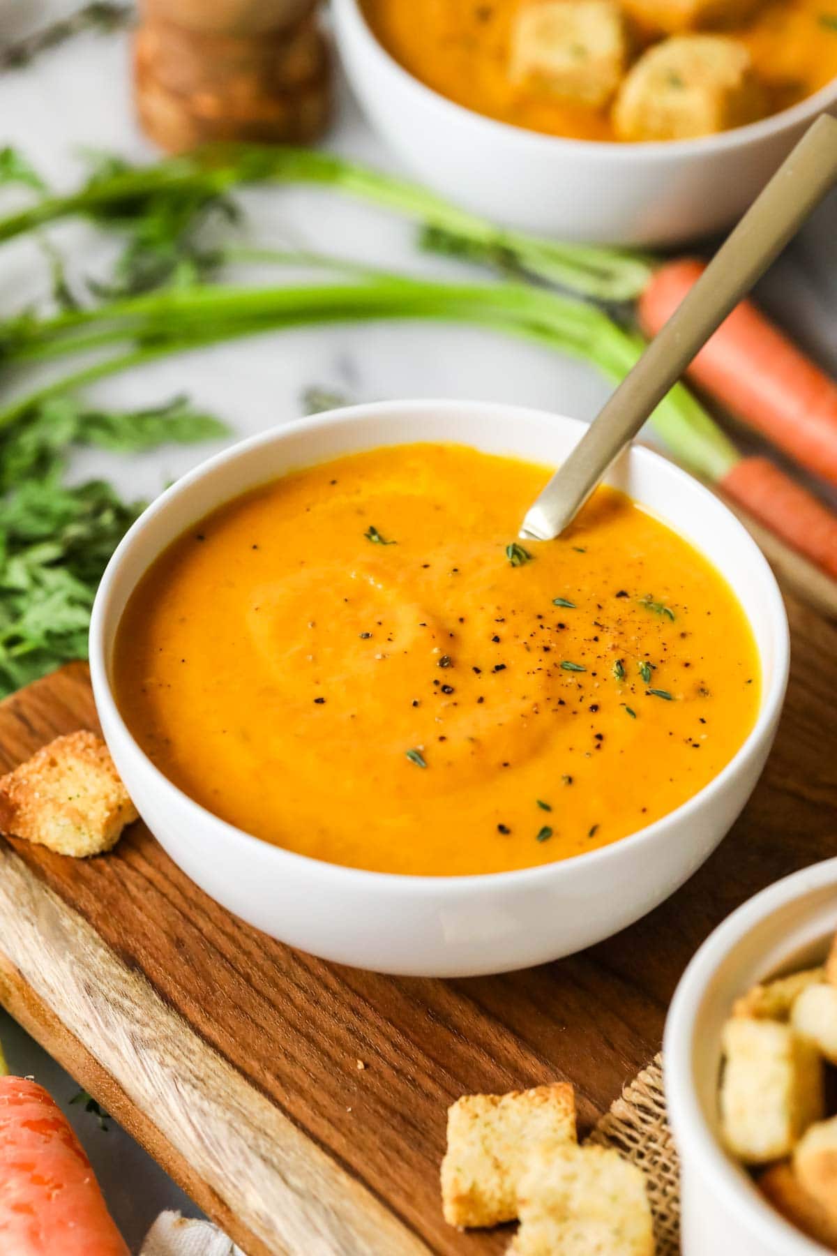 Bowl of soup made from roasted carrots.
