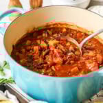 Pot of vegetarian chili made with sweet potato, beans, and more.