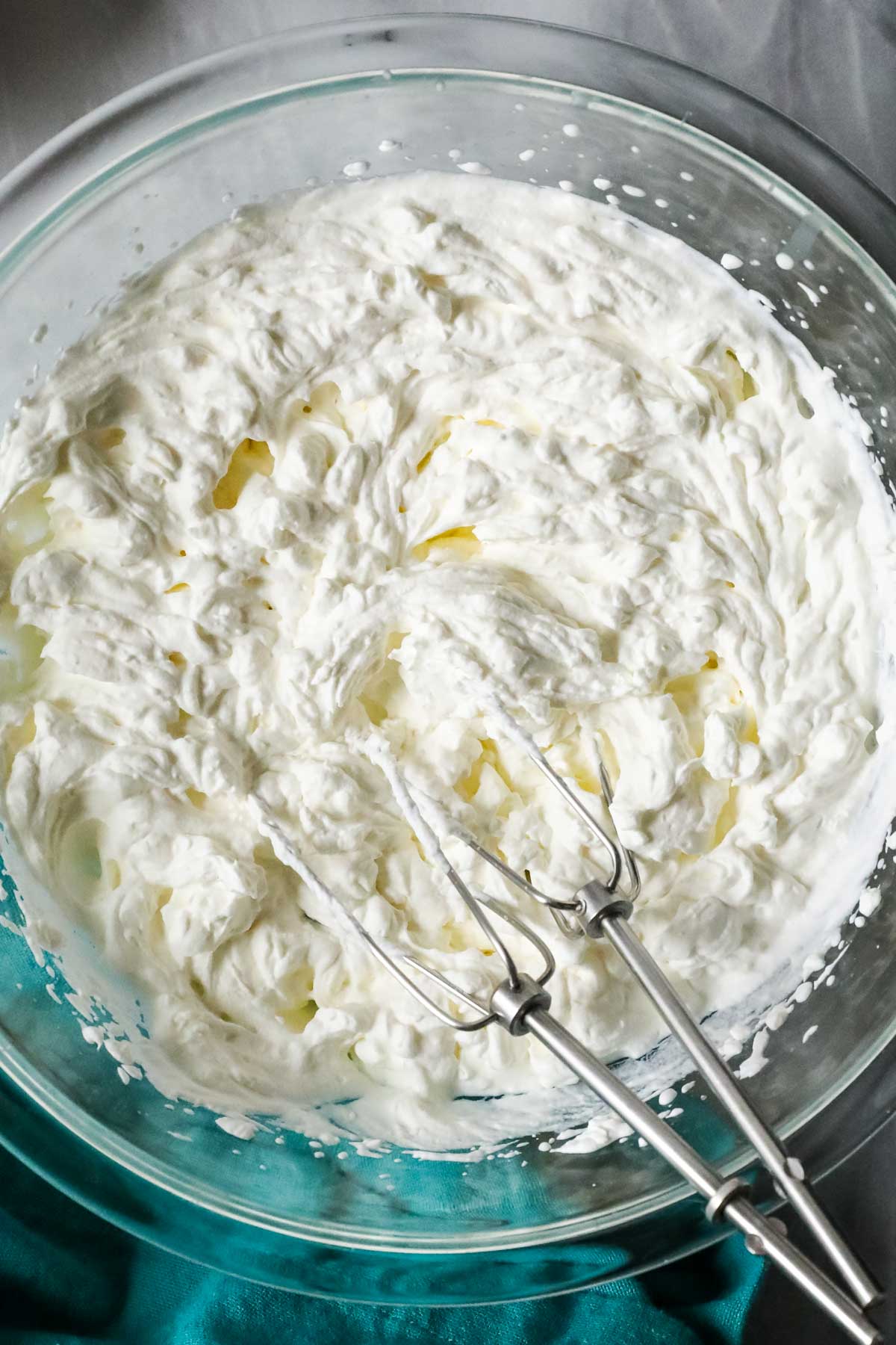 Overhead view of a bowl of whipped cream.