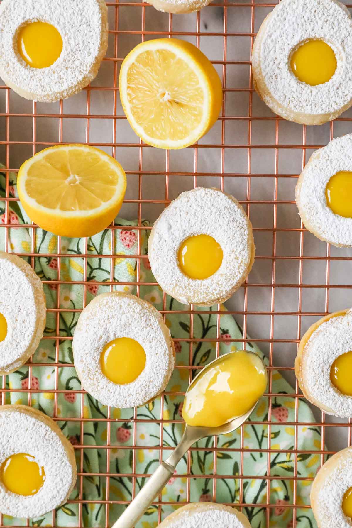 Overhead view of egg cookies made with lemon curd on a cooling rack.