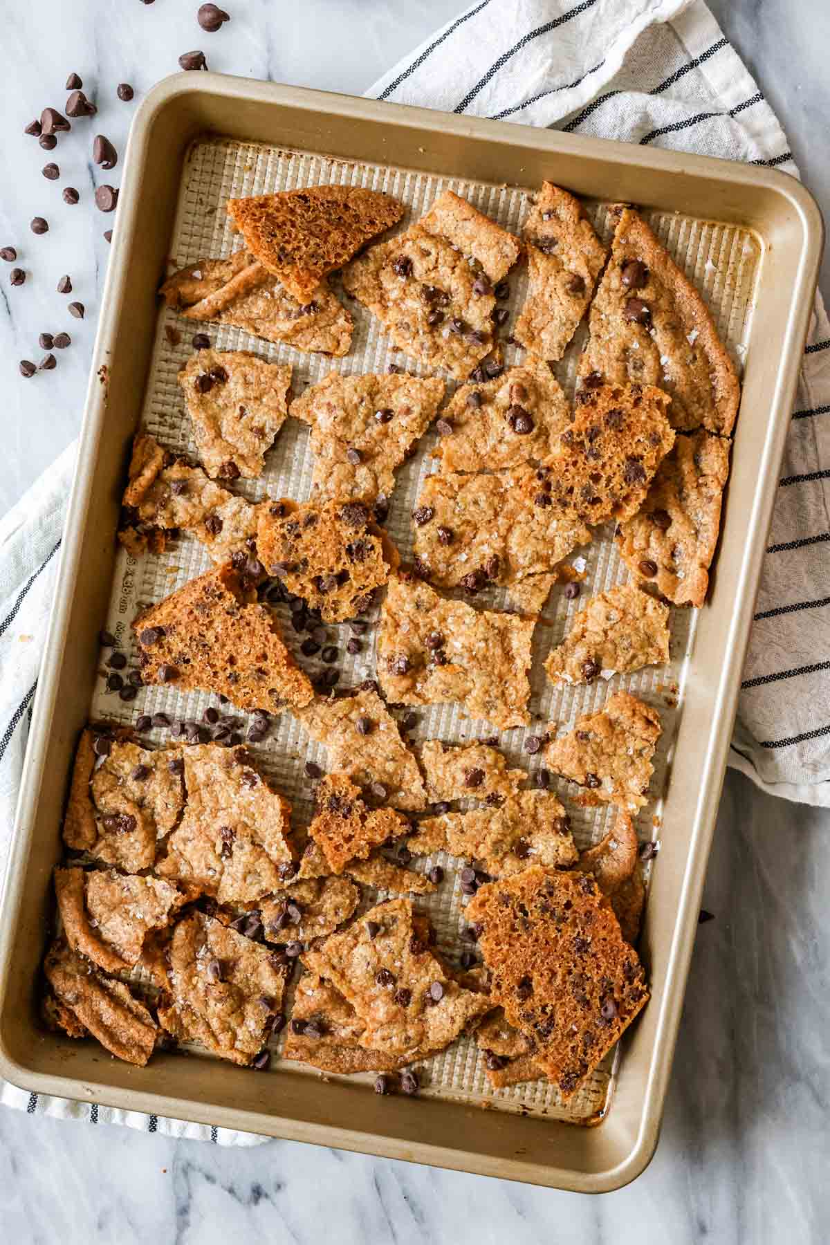 Overhead view of cookie brittle on a baking sheet.