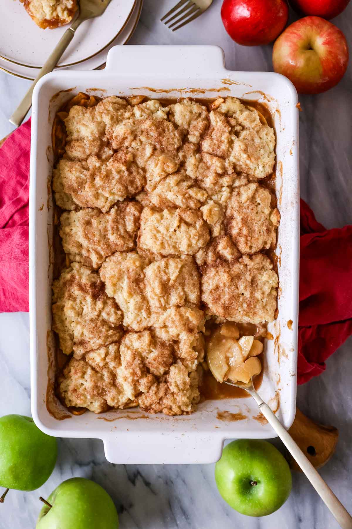 Overhead view of apple cobbler in a casserole dish.