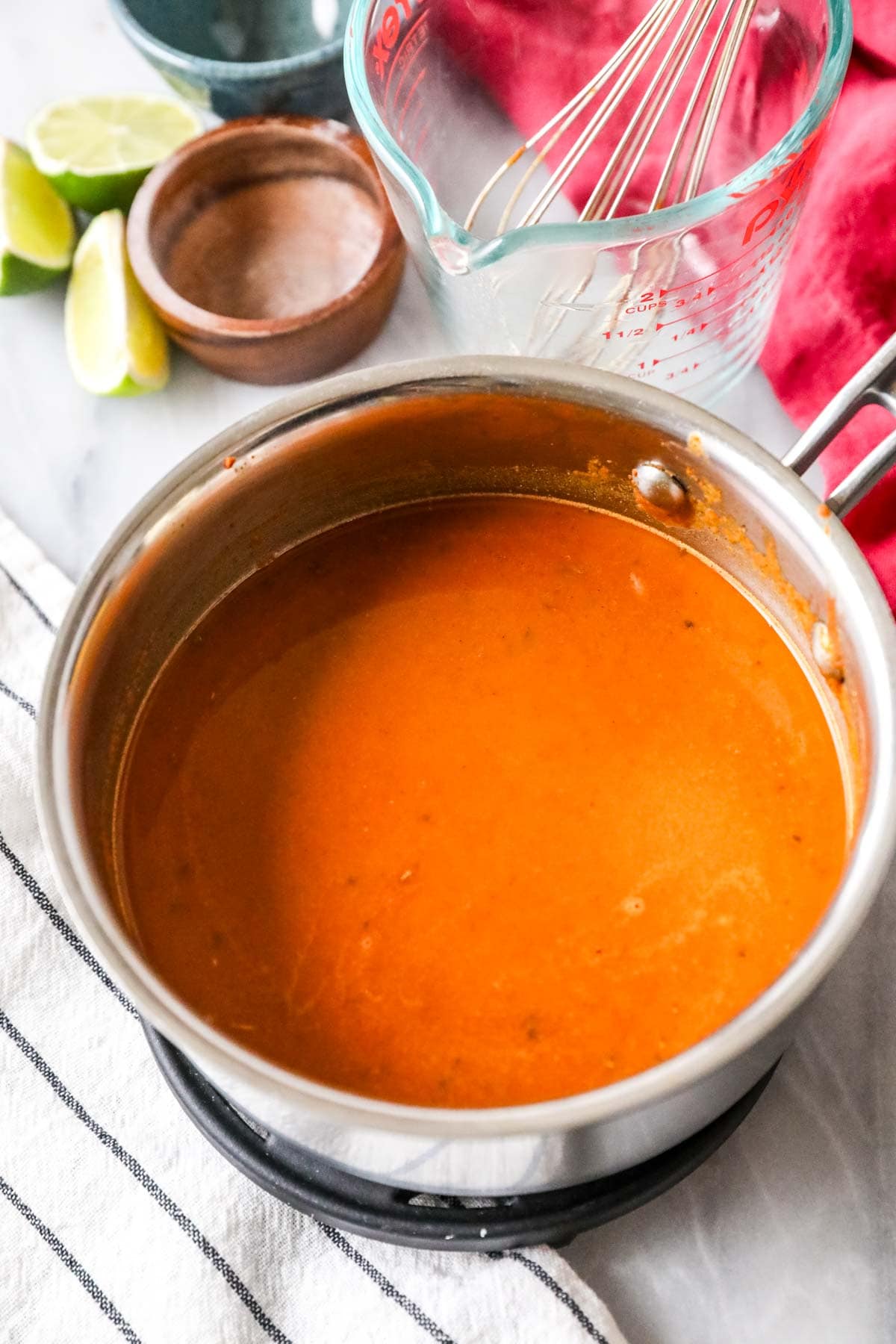 Enchilada sauce in a pan.