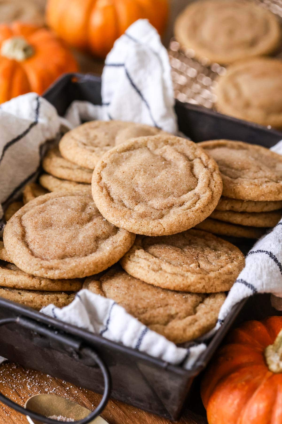 Pumpkin spice cookies in a towel lined pan.