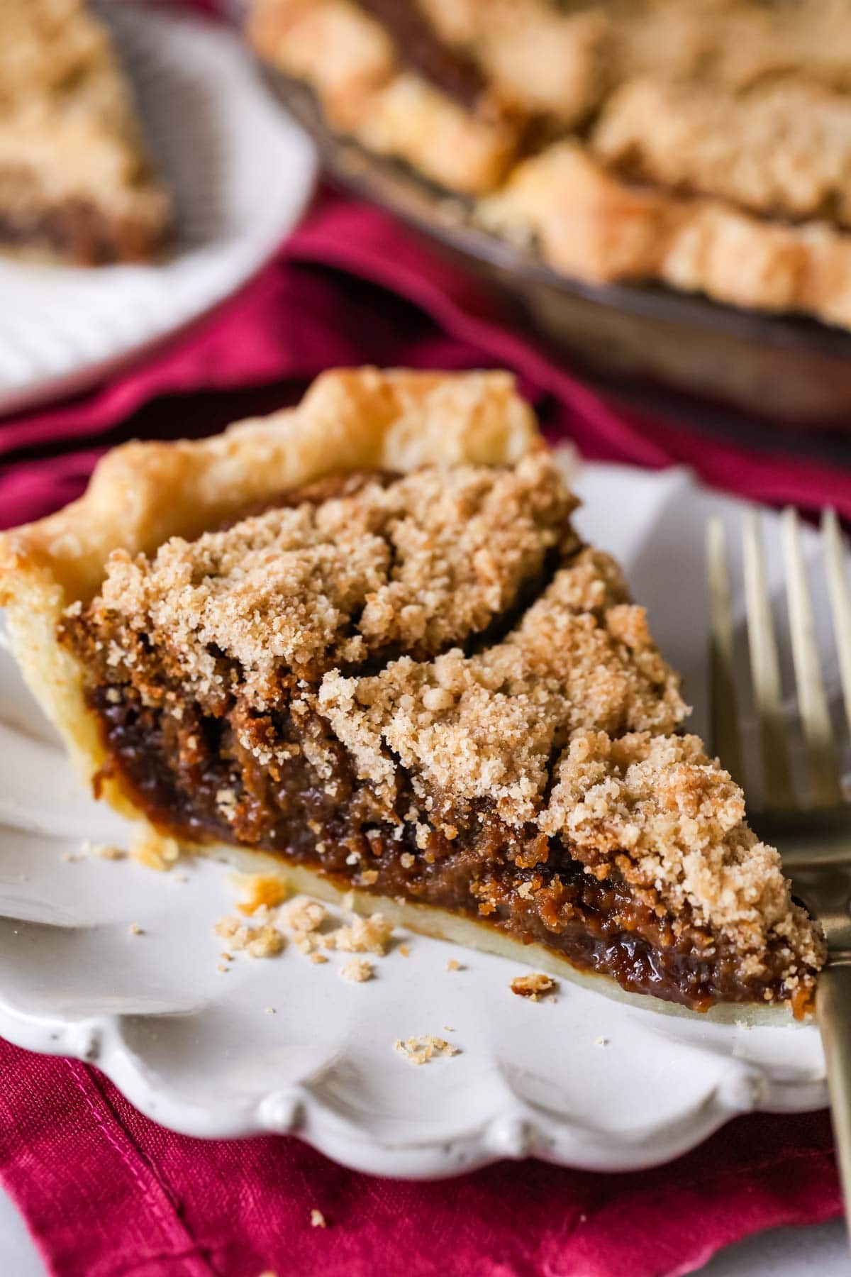 Slice of shoofly pie on a plate.